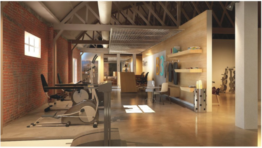 Finished gym visual with brick walls, timber flooring and warm lighting.